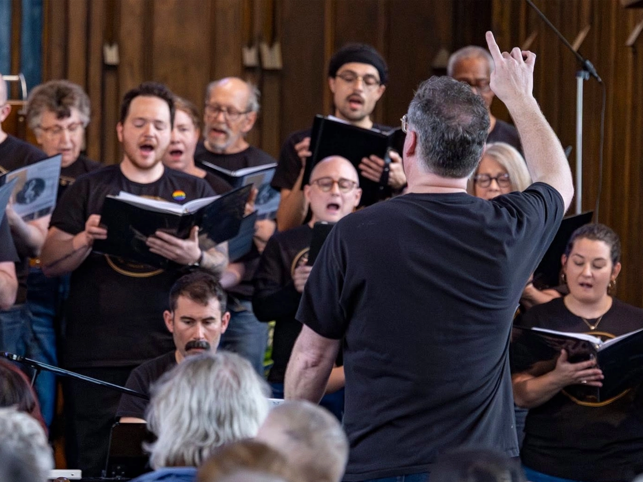 The Harmony Collected Community Choir singing together